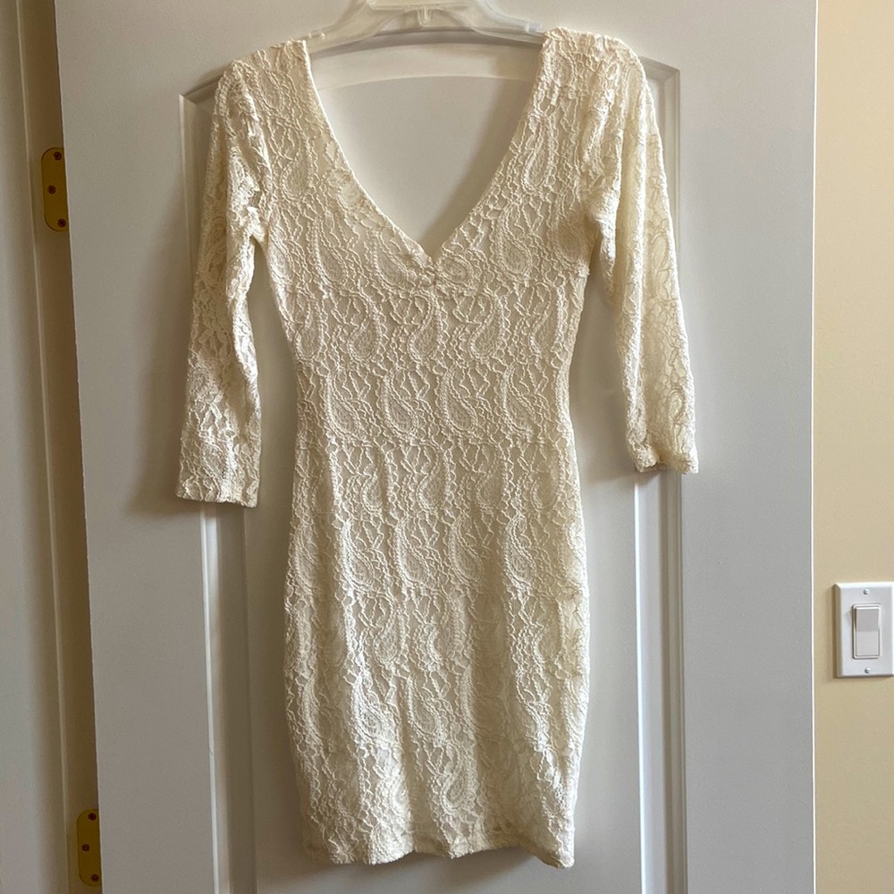 Pins and needles lace body con dress in size S